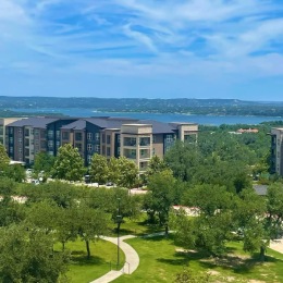 an apartment building near a lake