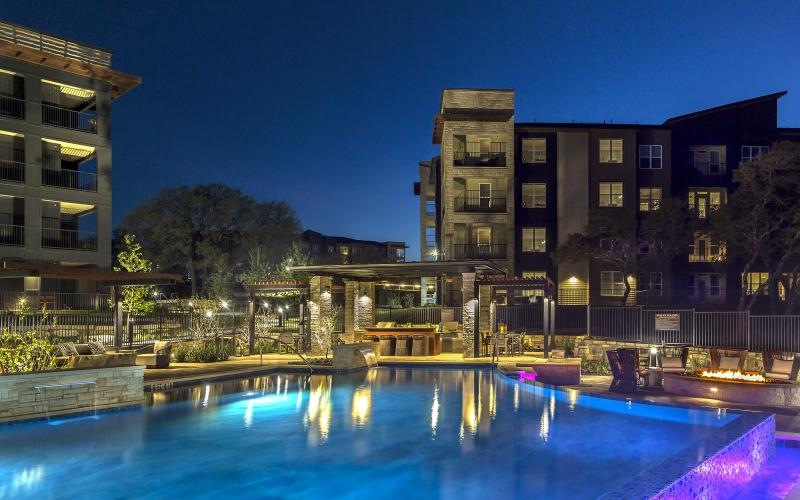 a pool in front of a building